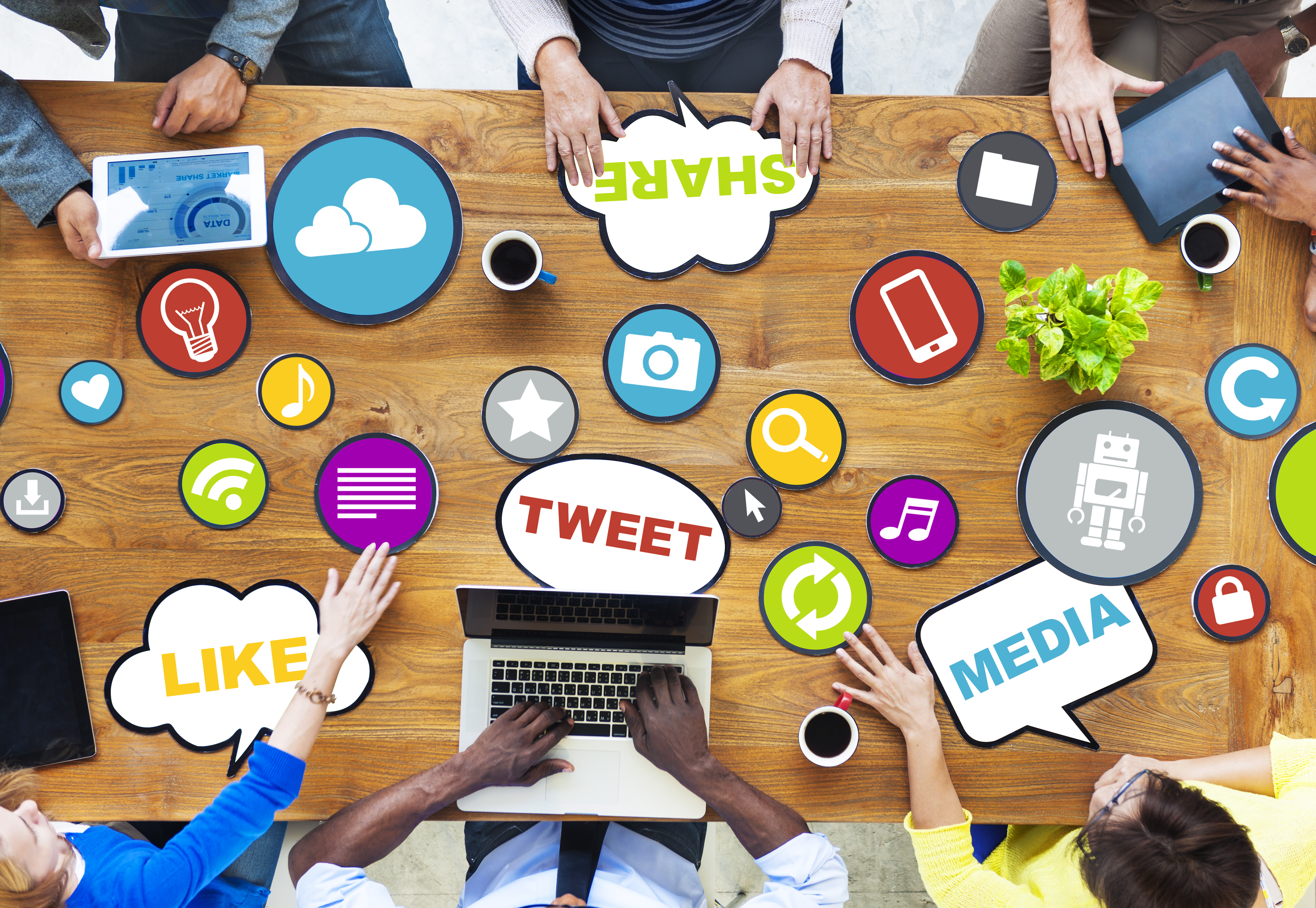 Table covered with social media icons